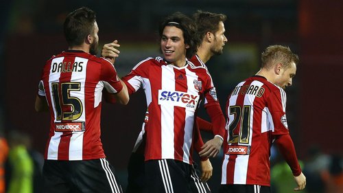 Relive some classic action from the English Football League. Here, a west London derby in the Sky Bet Championship between Brentford and Fulham at Griffin Park in November 2014.
