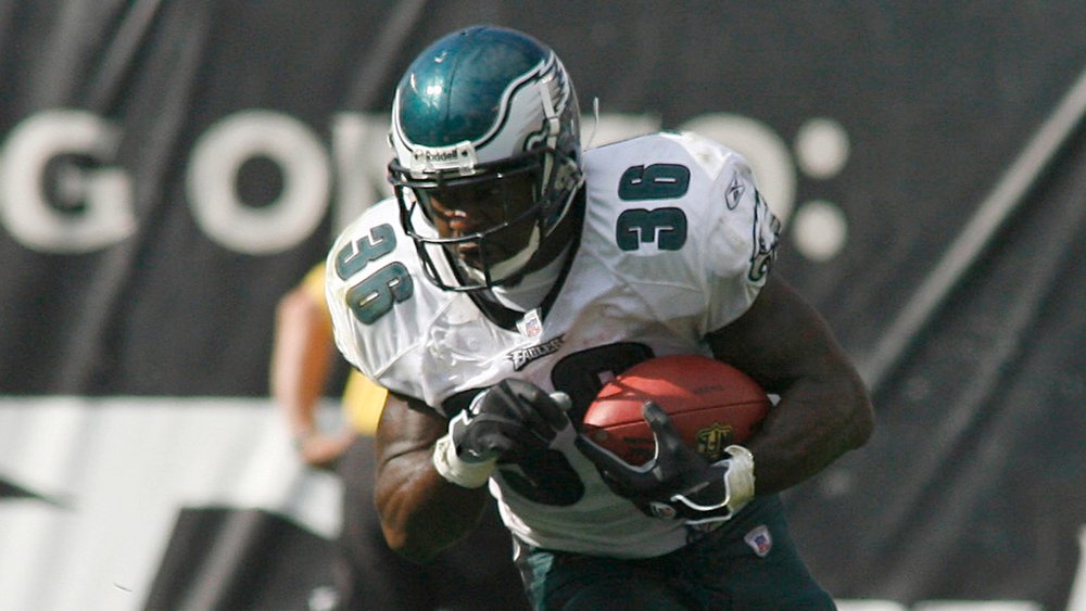 Philadelphia Eagles' free safety Brian Dawkins makes a flying