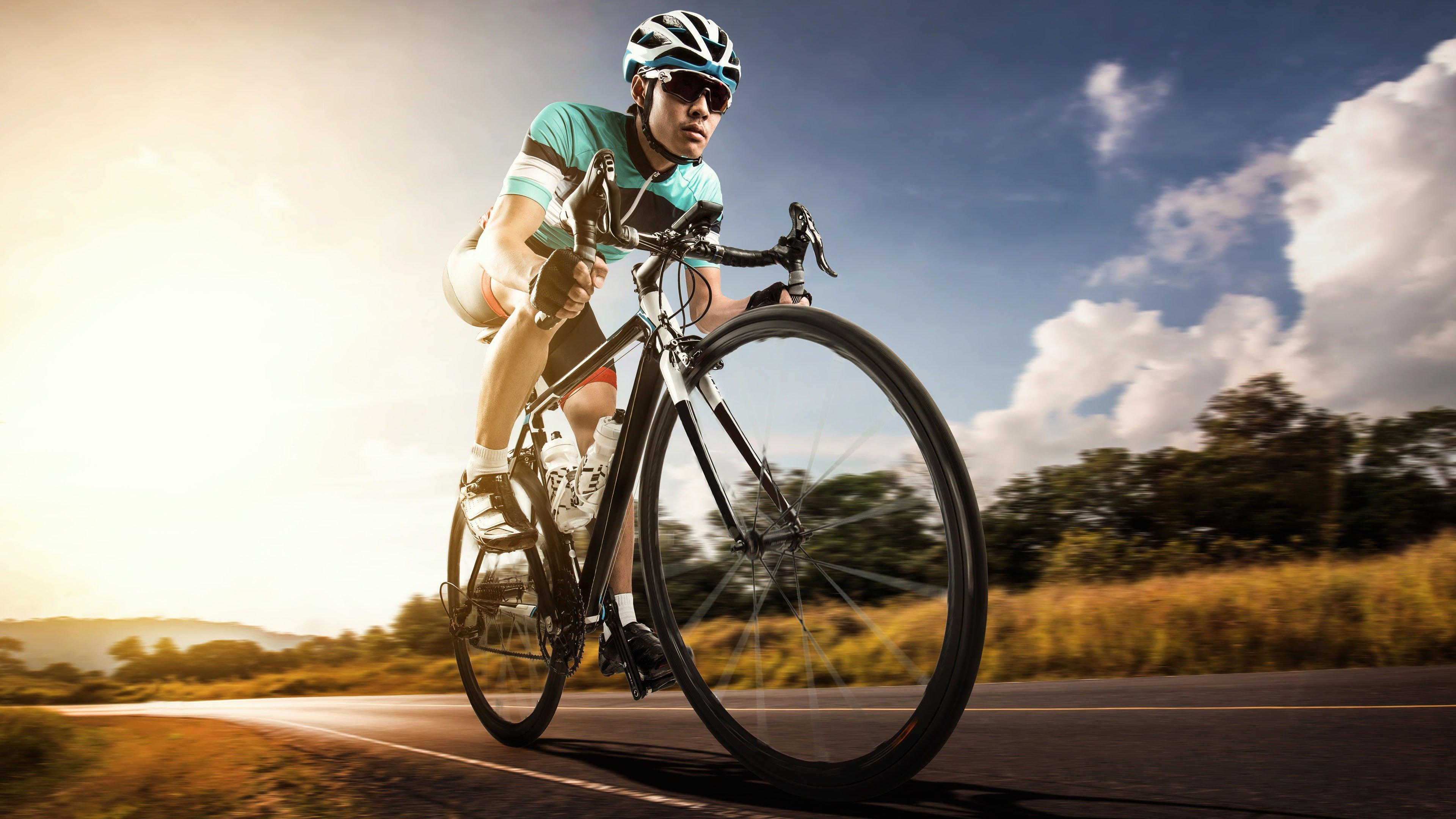 Riding bicycle. Велосипедный спорт. Езда на велосипеде. Человек на велосипеде. Велосипедист едет.